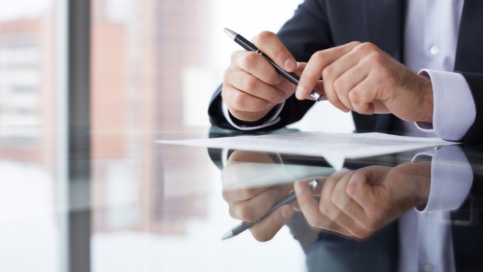 bigstock-Close-up-of-male-hands-with-pe-46137757-705×397